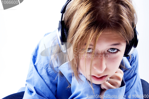 Image of Young girl in headphones   