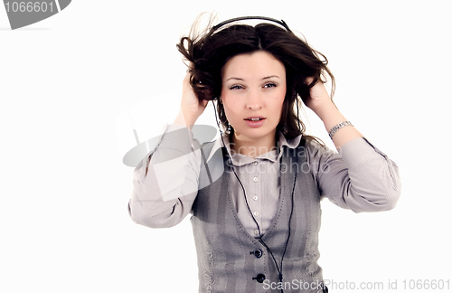 Image of Young girl in headphones   