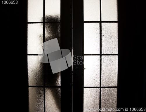 Image of Girl behind the glass    