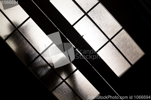 Image of Girl behind the glass    