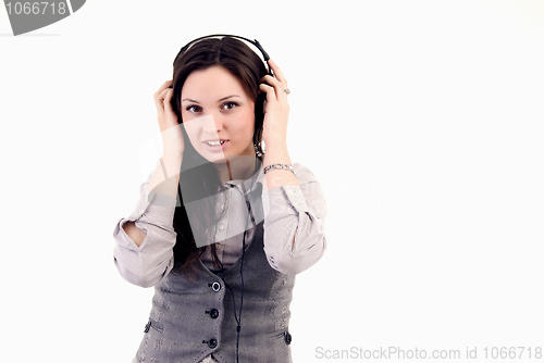 Image of Young girl in headphones   