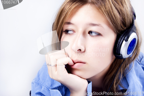 Image of Young girl in headphones   