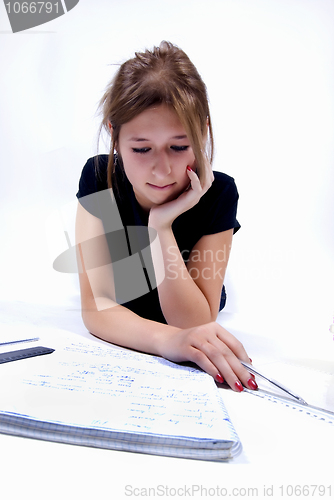 Image of girl spending time in studying 