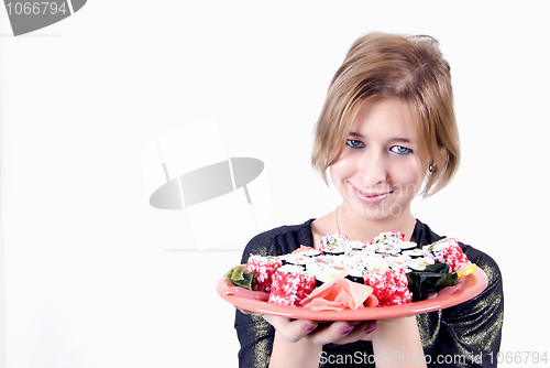 Image of girl with sushi  