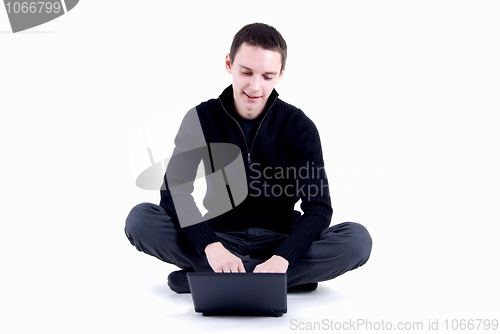 Image of man with laptop