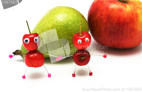 Image of two amusing little men from a sweet cherry