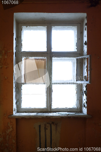 Image of The closed old decayed window