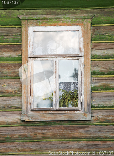 Image of Window of wooden house