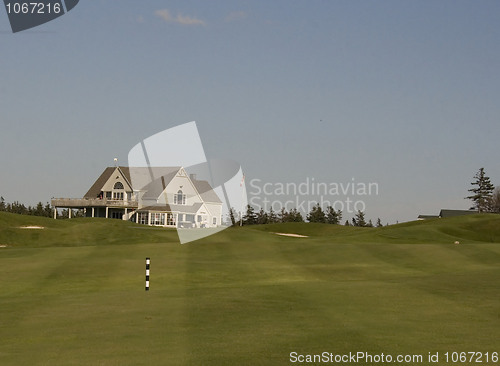 Image of golf clubhouse and fairway