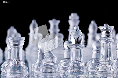 Image of Macro shot of glass chess set against a black background