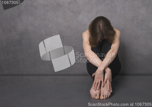 Image of Sad woman, studio shot