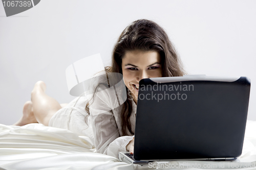 Image of Working on the bed