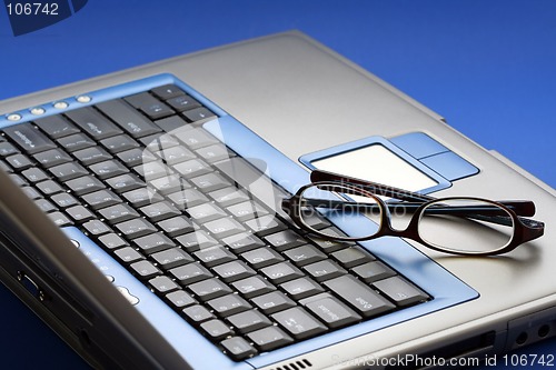 Image of Glasses on laptop