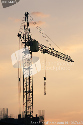 Image of Lifting crane in evening