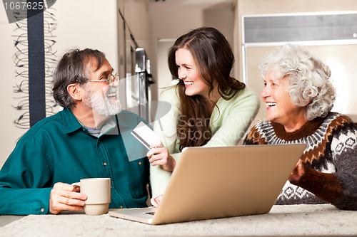 Image of Senior couple shopping online