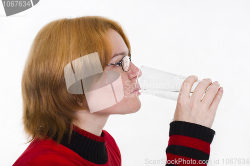 Image of The girl with a water glass