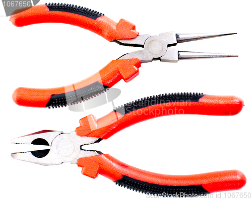 Image of Two pliers on a white