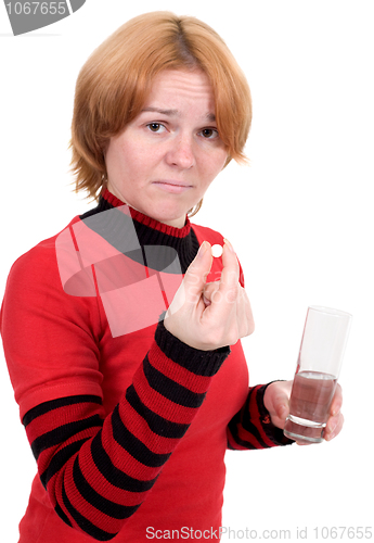 Image of Sick girl with tablet