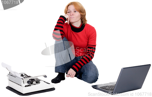 Image of Girl with the laptop and a typewriter