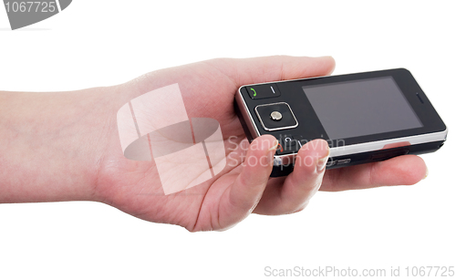 Image of Hand with a cellular telephone