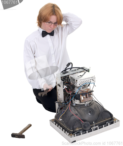 Image of Girl repairing electronic equipment