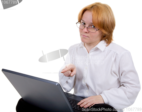 Image of Girl working on the black laptop