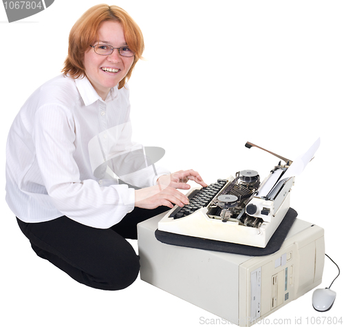 Image of Girl printing on an typewriter