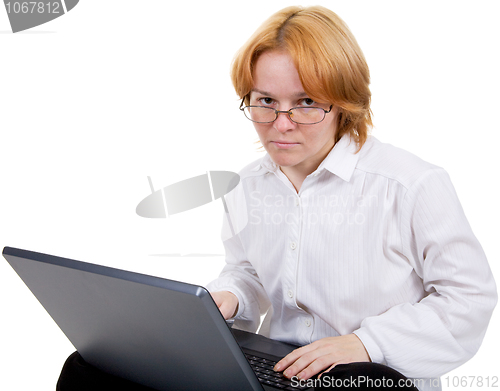 Image of Girl working on the notebook