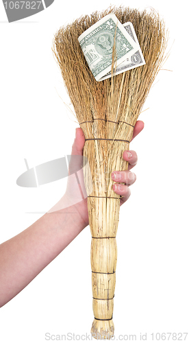 Image of Dirty broom with dollar