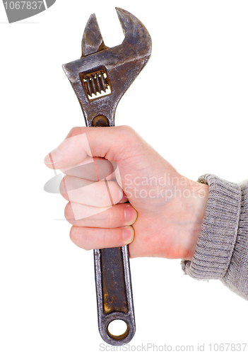 Image of Big wrench in a man's hand