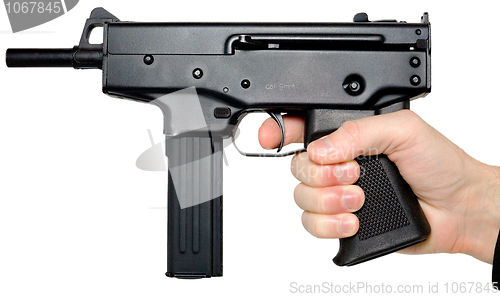 Image of Hand holding the big pistol