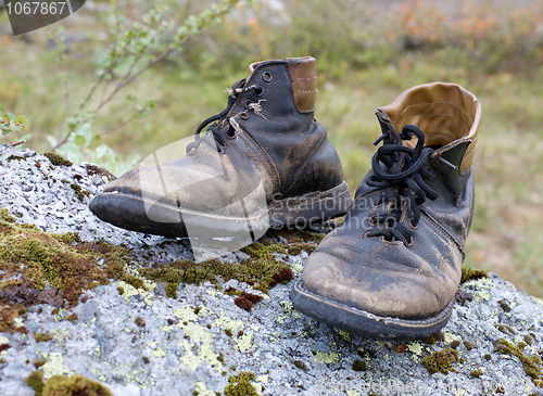Image of Old torn boots
