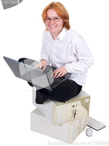 Image of The girl working on the laptop