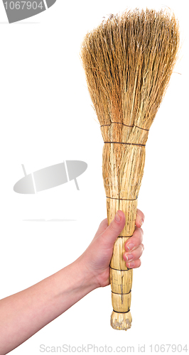 Image of Old dirty broom in hand