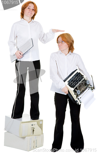 Image of Girl with the computer keyboard, and girl with a typewriter