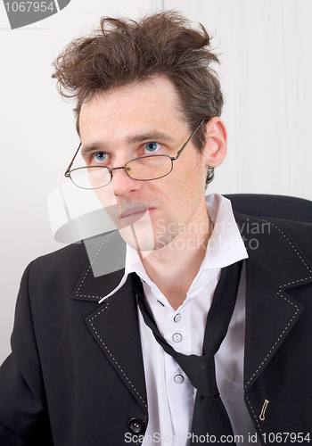 Image of Businessman gone mad of work