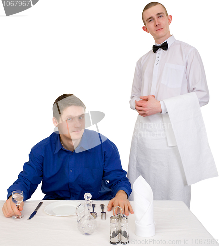 Image of Waiter and guest of restaurant