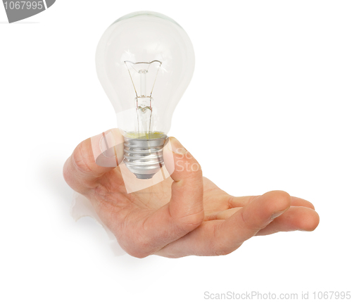Image of Male hand holding lbulb