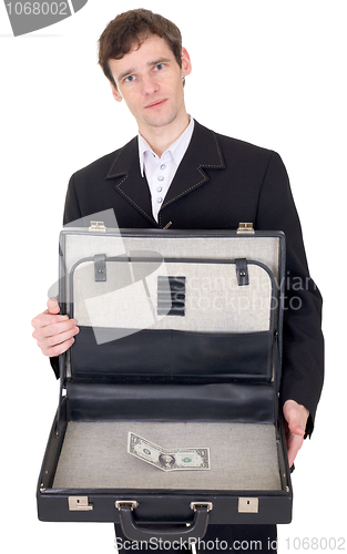 Image of Man with suitcase containing dollar