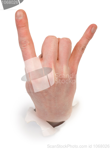 Image of Gesture male hand through white paper