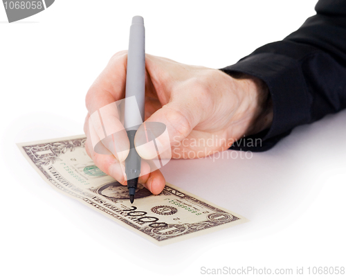 Image of Male hand draw nil on dollar