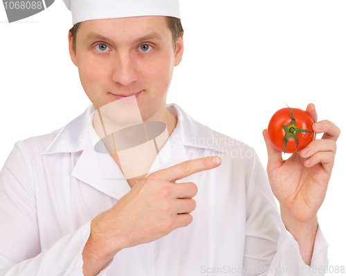 Image of Cook with tomato in hand