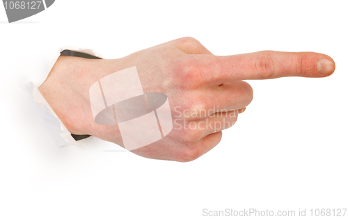 Image of Gesture male hand through white paper 