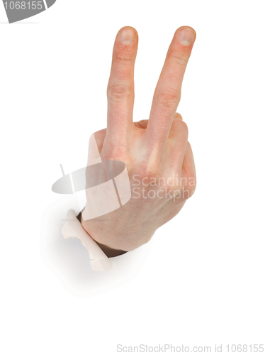 Image of Gesture male hand through white paper