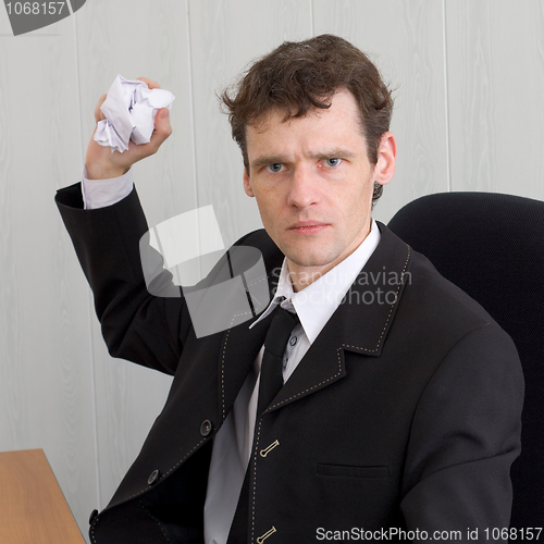 Image of Director throwing crumpled paper