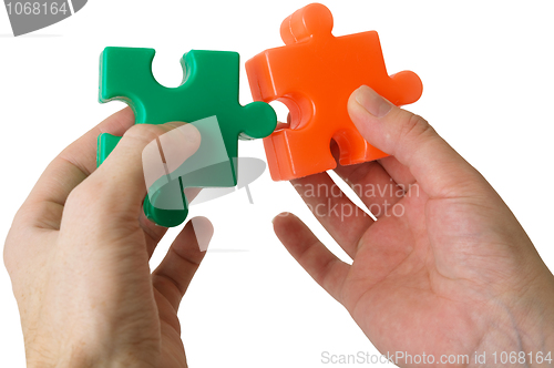 Image of Hand and puzzle