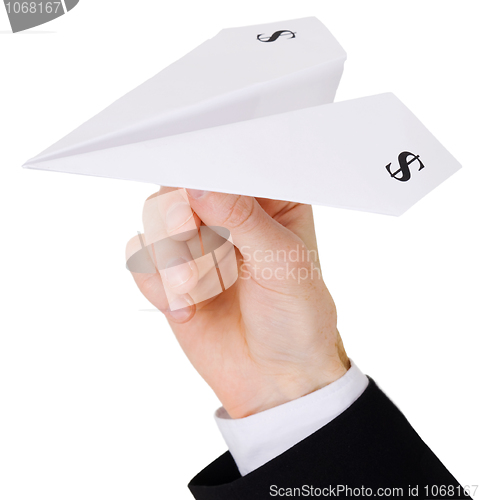 Image of Male hand holding airplane of dollar