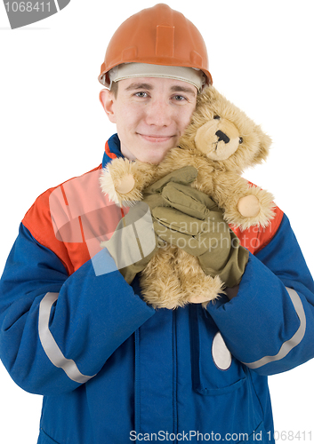 Image of Builder and toy bear