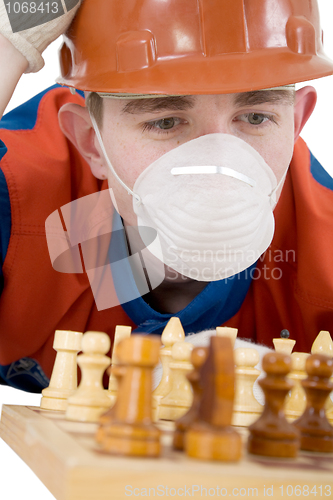 Image of Worker and chess