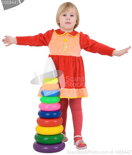 Image of Little girl and toy pyramid